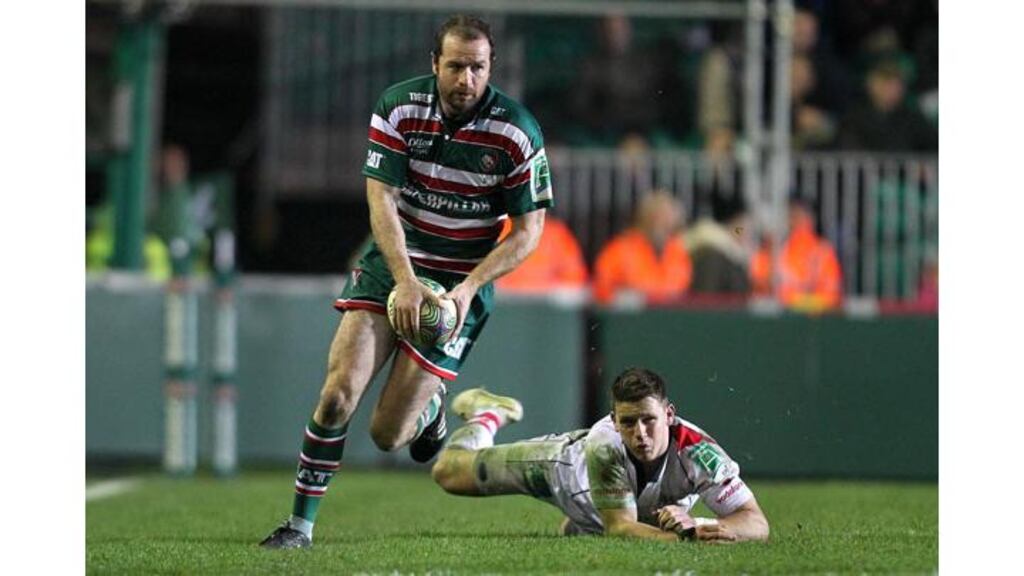 Geordan Murphy evades Craig Gilroy during this evening’s match at Welford Road. Photograph: Lorraine O'Sullivan/Inpho