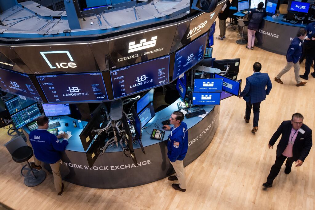 Traders working on the floor of the New York Stock Exchange. The S&P 500 and the Nasdaq hit record highs, powered by semiconductors and megacaps, as Congress heard testimony from Federal Reserve chairman Jerome Powell, who said more 'good' economic data would strengthen the case for interest rate cuts. Photograph: Michael Nagle/Bloomberg