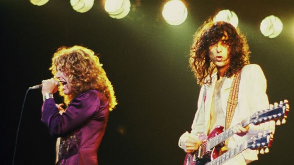Robert Plant, left, and Jimmy Page perform in Chigago in 1977.