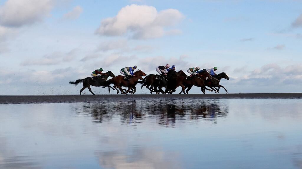 A general view of the runners and riders in action as they compete in the Melbourne 10 Sorry We Can’t Be There This Year Handicap at Laytown on Monday. Photograph: Niall Carson/PA Wire