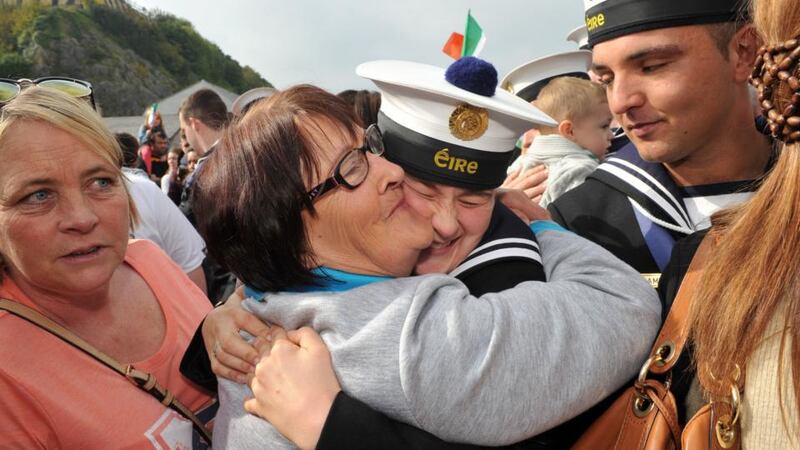 Able Comms Shauna Ferro gets a hug from mother Catherine on the LÉ Niamh’s return to Haulbowline Naval Base, Cork after humanitarian and search-and-rescue operations in the Mediterranean. Photograph: Daragh McSweeney/Provision
