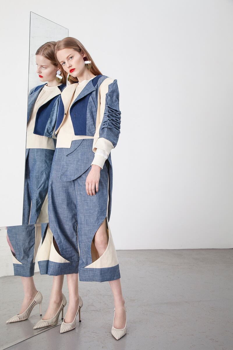 Denim tuxedo with ruched sleeves detail €275, offset crop denim and organic jersey top €165, crop trouser with pocket layer at waist and open leg detail €215, strappy stilettoes Zara €49.95, earrings Capulet + Montague €58