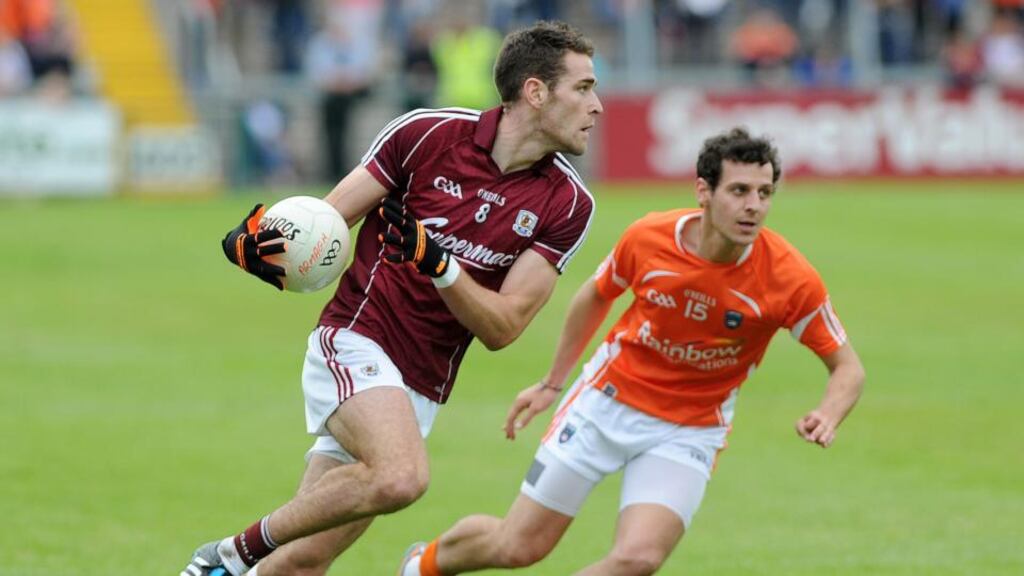 Galway’s Fiontan O’Curraoin and Armagh’s Jamie Clarke Photograph: Declan Roughan/Inpho/Presseye