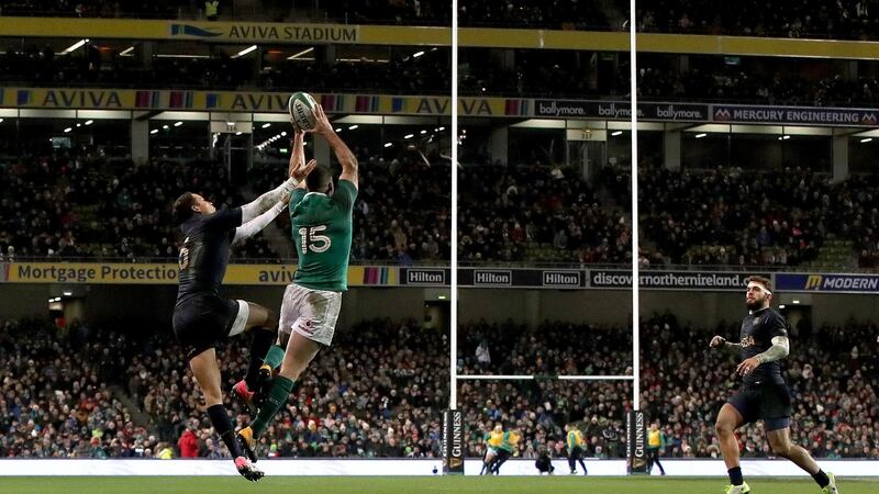 Ireland’s Rob Kearney claims a high ball ahead of Joaquin Tuculet. Photograph: Bryan Keane/Inpho