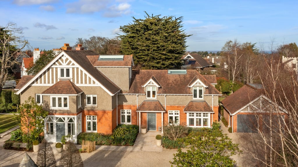 Baile an Mhóta, on Kerrymount Avenue in Foxrock, Dublin 18, has bedrooms, numerous bathrooms, a home cinema, a cocktail bar, and gardens designed by Diarmuid Gavin