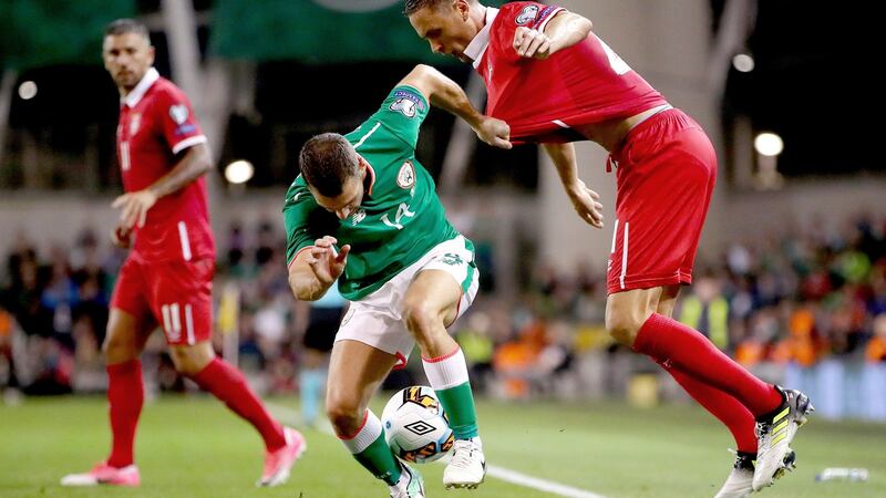 Ireland’s Wes Hoolahan in action against Nemanja Matic of Serbia during the World Cup qualifier at the Aviva Stadium. Photograph:   James Crombie/Inpho