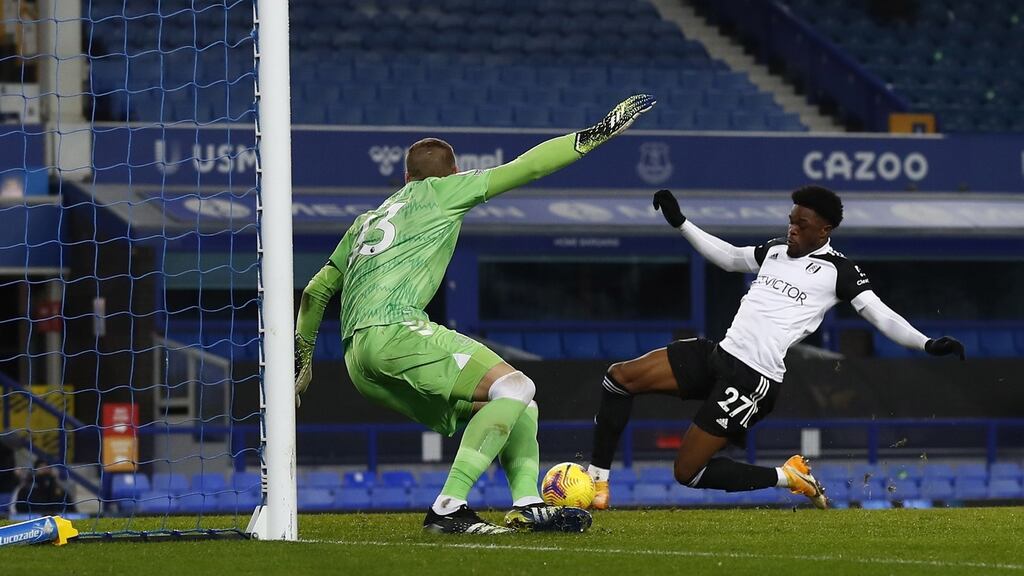 Josh Maja of Fulham scores the opening goal in their Premier League win over Everton. Photo: Jason Cairnduff/EPA