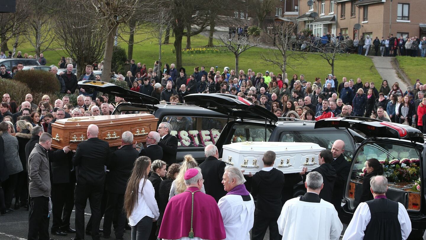Coffins are placed into hearses at the Holy Family church, Ballymagroarty, Derry, after the funeral of the five people who were killed when their car slid off a slipway in Buncrana, Co Donegal. Photograph: Brian Lawless/PA Wire