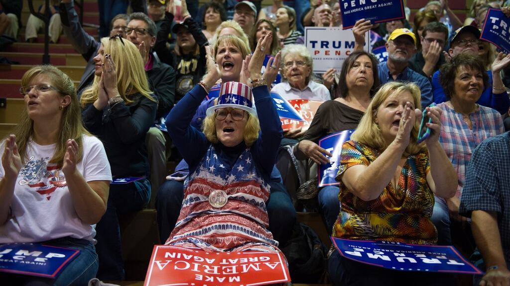 Supporters cheer during a rally for Donald Trump in Ambridge, Pennsylvania, on Monday. Photograph: Jeff Swensen/Getty Images