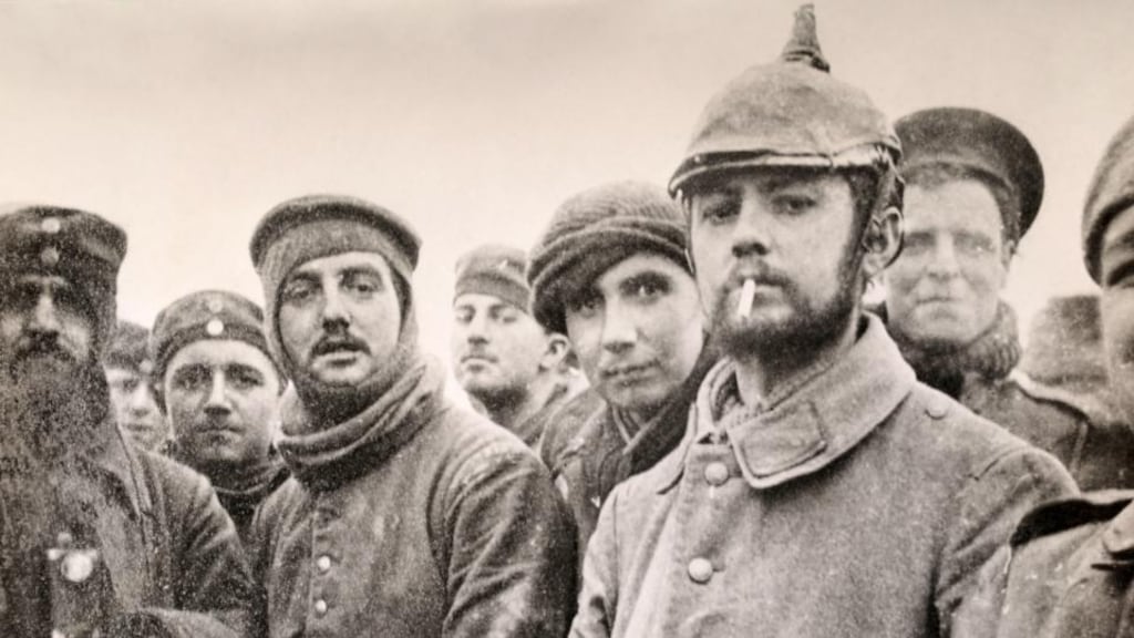 Soldiers of the 5th London Rifle Brigade with German Saxon regimental troops at Ploegsteert Wood during the Christmas Truce of the first World War in December 1914. Photograph: Popperfoto/Getty Images