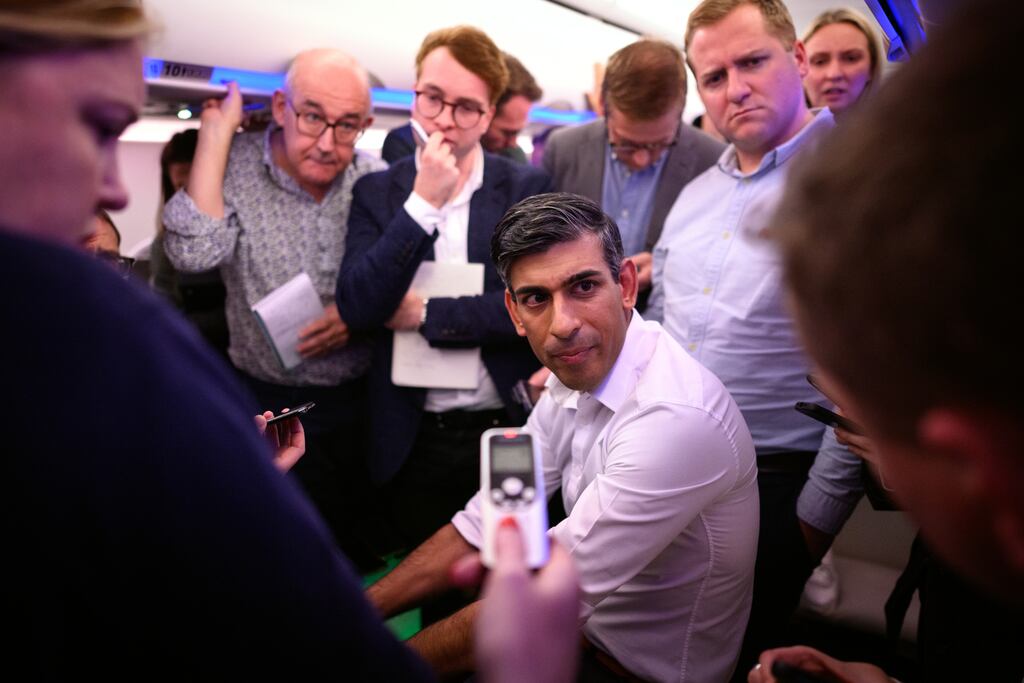British prime minister Rishi Sunak holds a "huddle" press conference with political journalists on board a government plane on Sunday as he heads to Bali, in Indonesia to attend the G20 summit. Photograph: Leon Neal/PA