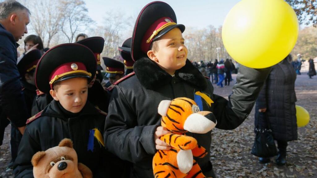 Ukrainian cadets after assembling yesterday by a monument for victims of the Nazi massacre in Babiy Yar in Kiev. The country is marking the 70th anniversary of liberation from the Nazis. Photograph: Sergey Dolzhenko