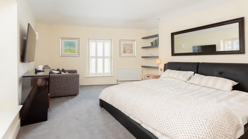 Large ensuite and walk-in wardrobe give the main bedroom at 4 Sussex Terrace the wow factor