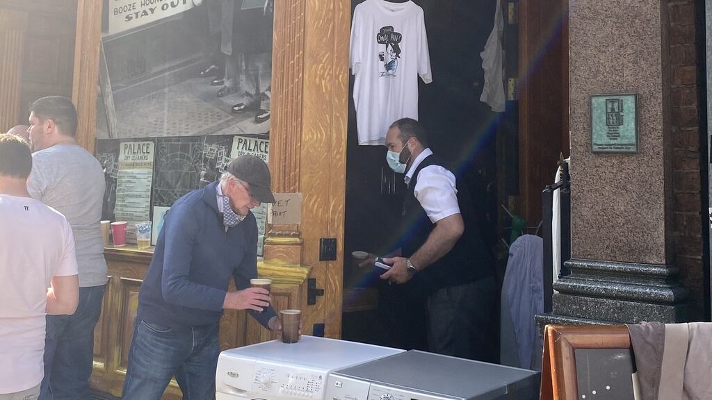 The Palace Bar in Fleet Street has seen the funny side of things. Since reopening for takeaways, the premises is disguised as a laundry.