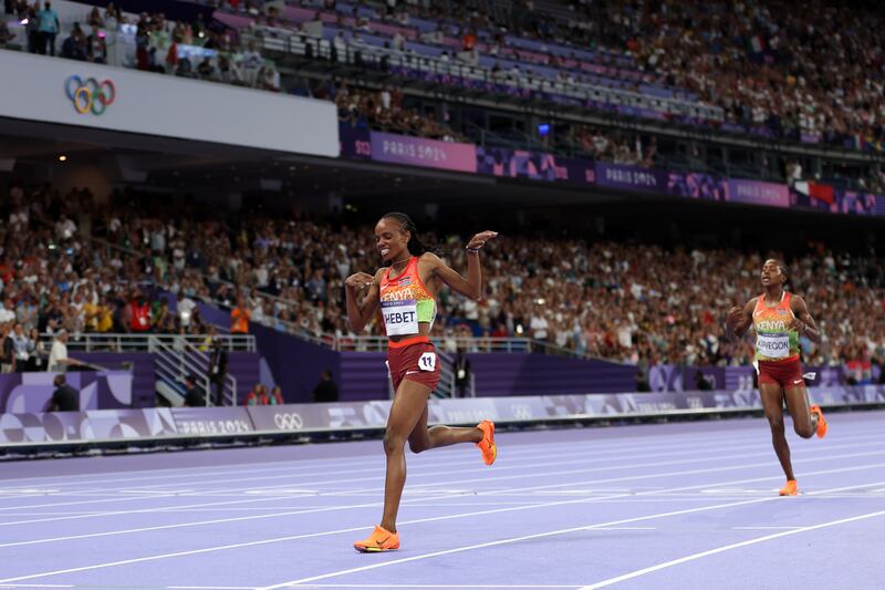 Beatrice Chebet of Kenya celebrates winning the gold medal in the women's 5,000m final at Stade de France. Photograph: Michael Steele/Getty Images