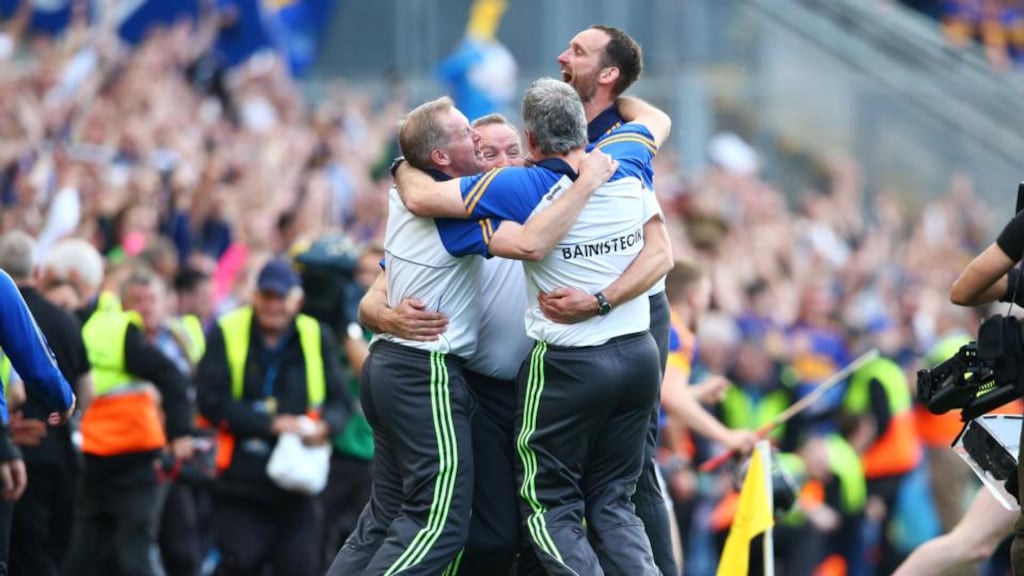 Tipperary manager Michael Ryan celebrates with Conor Stakelum, John Madden and Declan Fanning at the final whistle. Photo: Cathal Noonan/Inpho