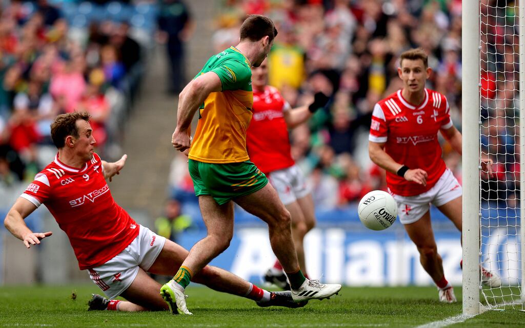 Eoghan Bán Gallagher scores Donegal’s goal during the second half of the All-Ireland SFC quarter-final against Louth at Croke Park. Photograph: Ryan Byrne/Inpho