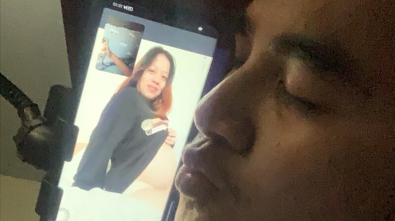 Rexter on the phone to his wife, Andrea Maria Cruz who is due their baby on June 13th.