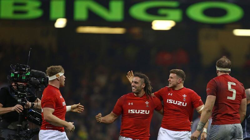 Wales players celebrate the Six Nations win over England at the Principality stadium in round three. Photograph: Geoff Caddick/AFP/Getty Images