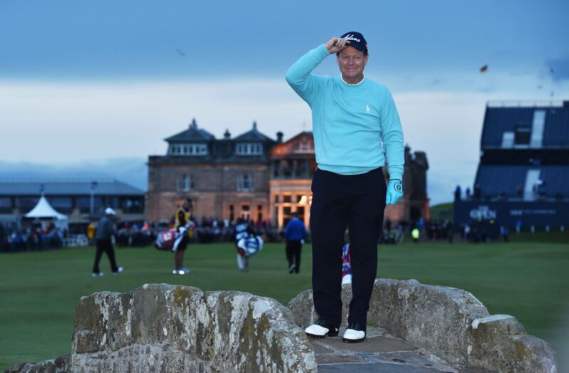 Tom Watson waves to the crowd from Swilcan Bridge to honour his final Open appearance during the second round of the 144th Open at the Old Course in St Andrews on July 17th, 2015. Photograph: