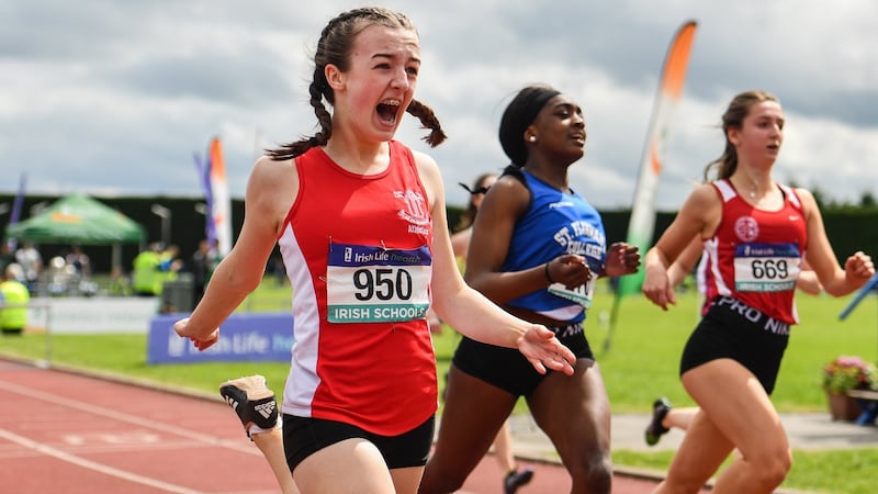 Niamh Moohan of Abbey Vocational School, Co Donegal celebrates winning the intermediate girls 80m hurdles during the Irish Life Health All-Ireland Schools Track and Field Championships in Tullamore. Photograph: Sam Barnes/Sportsfile