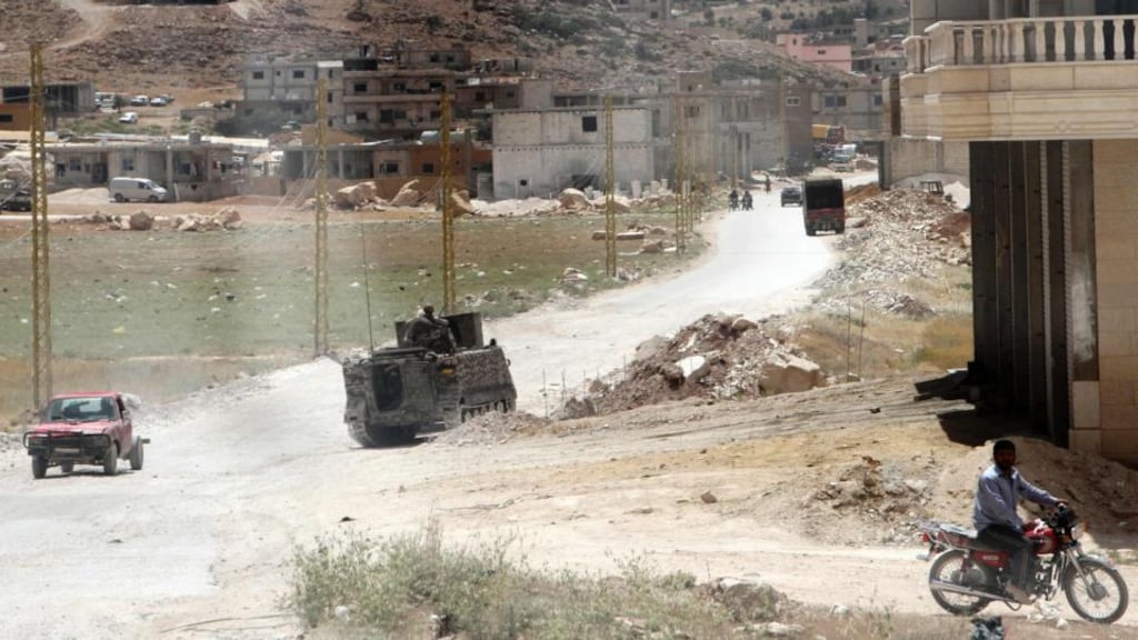 Lebanese Army soldiers patrol the the Sunni frontier village of Arsal, a bastion of the Syrian rebels, which was rocketed yesterday by Syrian aircraft in a tit-for-tat attack for Tuesday’s rebel missile strikes on the Shia town of Hermel, a Hizbullah stronghold. Photograph: Reuters/Ahmad Shalha