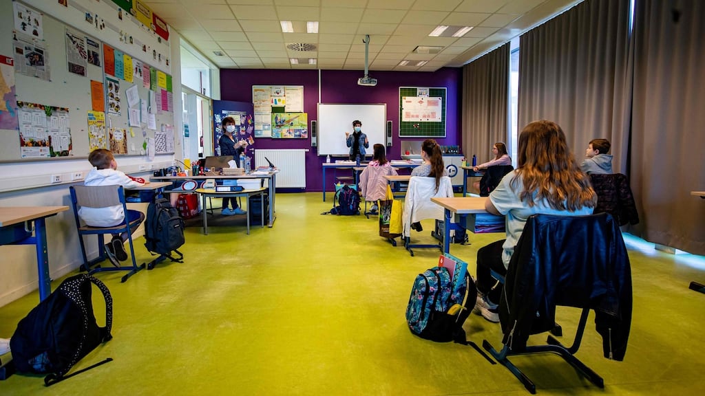 Pupils attend a class at Basisschool De Valke in Lichtervelde in Belgium on Friday as schools test the reopening and start again for a limited number of grades on Monday. Photograph:  Kurt Desplenter/Belga/AFP