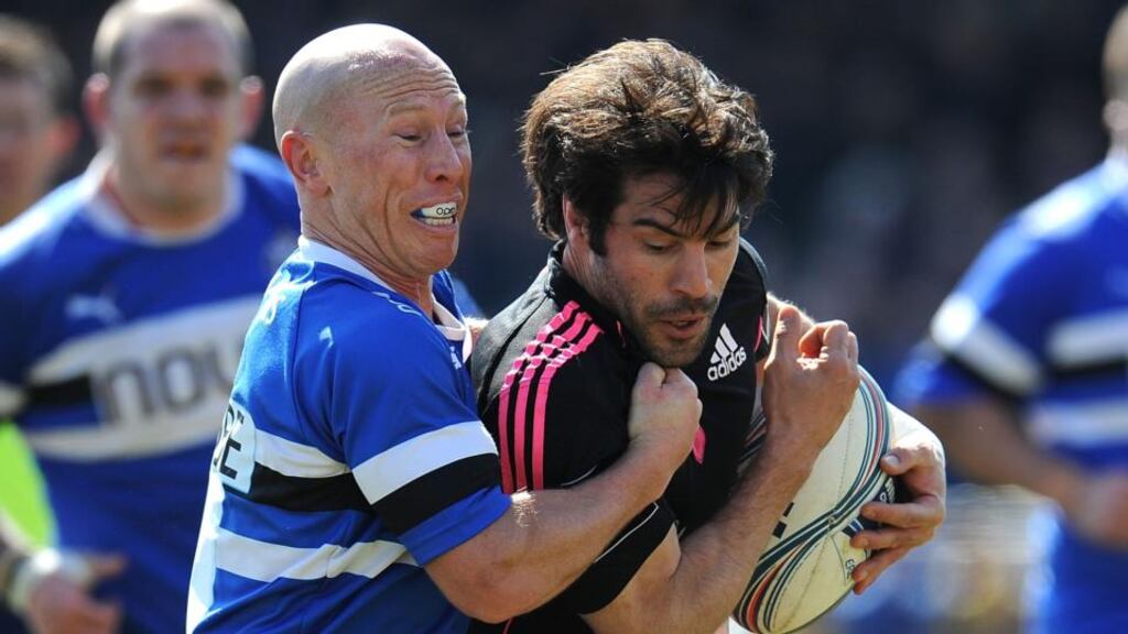 Peter Stringer of Bath and Jerome Fillol of Stade Francais in action during the Amlin Challenge Cup quarter-final at The Rec. Photograph: Tom Dulat/Getty Images
