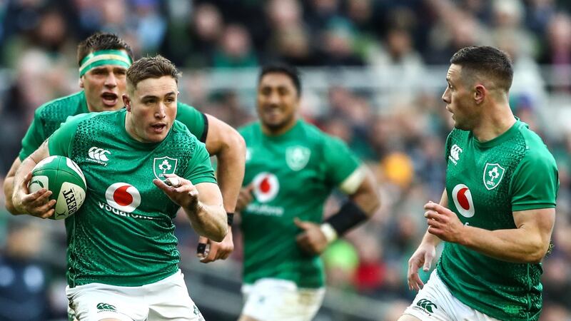 Larmour supported by John Cooney and CJ Stander. Photograph: James Crombie/Inpho