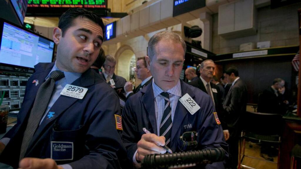 Traders work on the floor of the New York Stock Exchange. Photograph: Brendan McDermid/Reuters