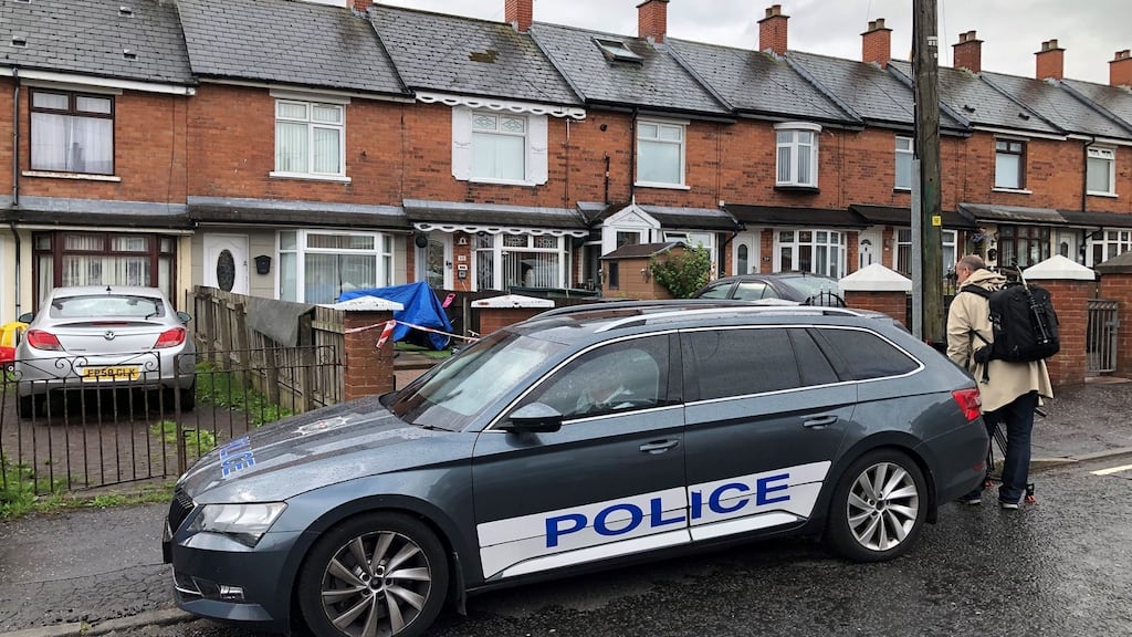 Police at the scene in Brompton Park, Belfast, where a baby was killed and another young child was critically injured following an incident at a house on Tuesday night. Photograph: Jonathan McCambridge/PA
