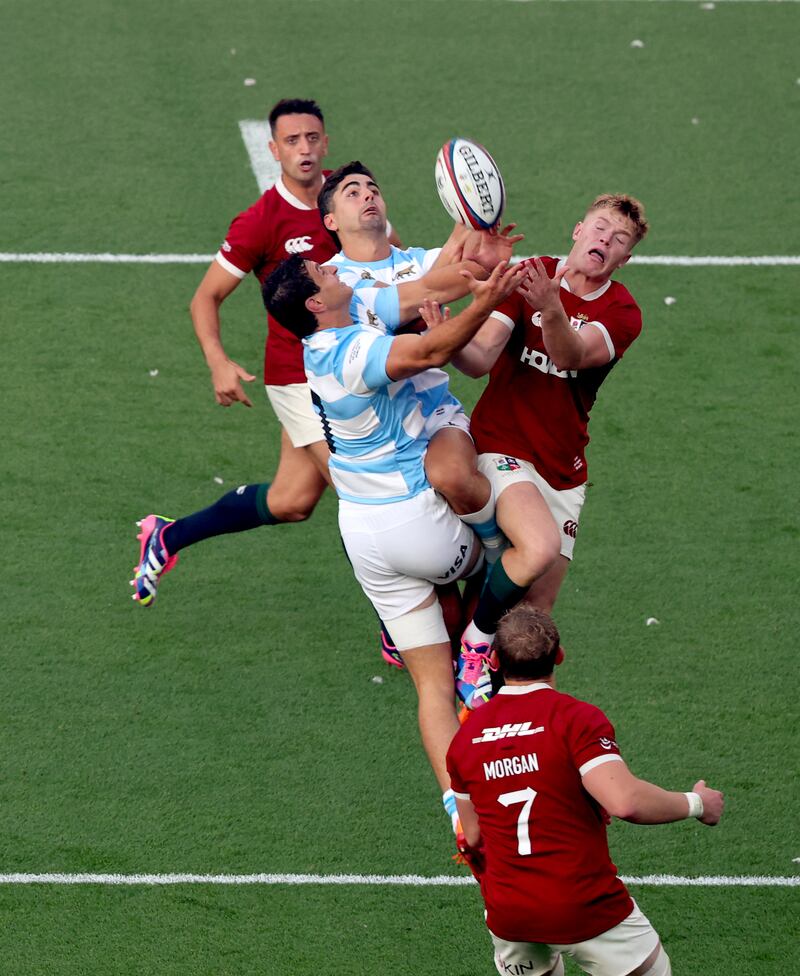 Argentina's Juan Martín González and Ignacio Mendy compete in the air with Fin Smith during the Lions' defeat in Dublin on Friday. Photograph: Ben Brady/Inpho