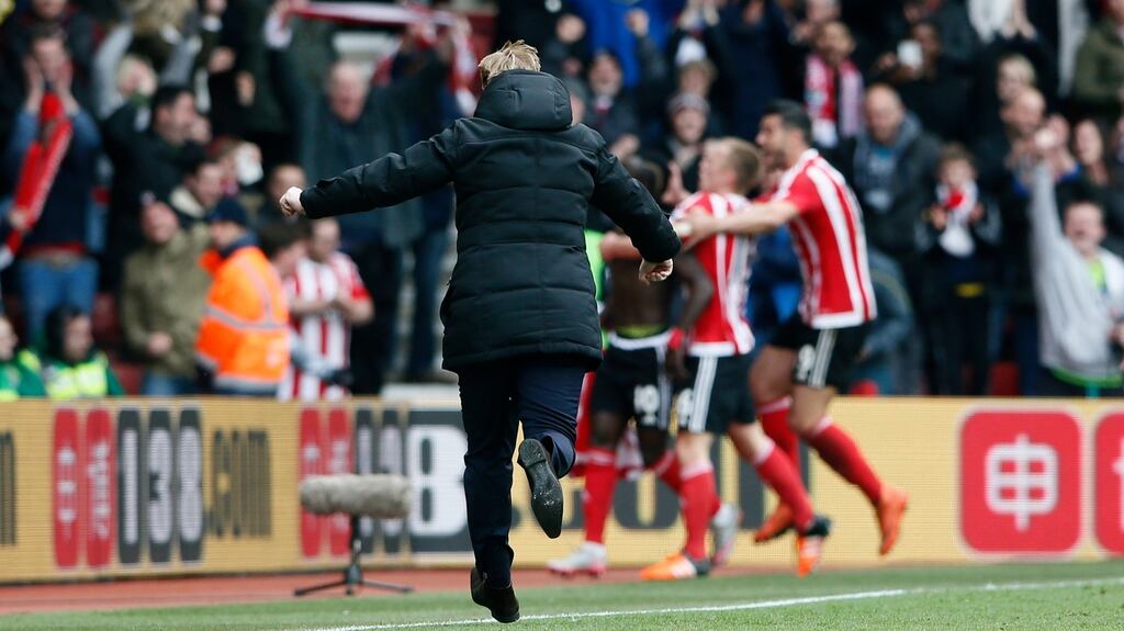 Southampton manager Ronald Koeman runs down the touchline after Sadio Mane bagged a late winner in their Premier League win over Liverpool. Photo: Stefan Wermut/Reuters