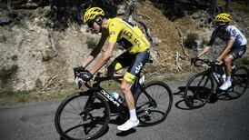 Tour de France: Chris Froome retains yellow jersey despite puncture