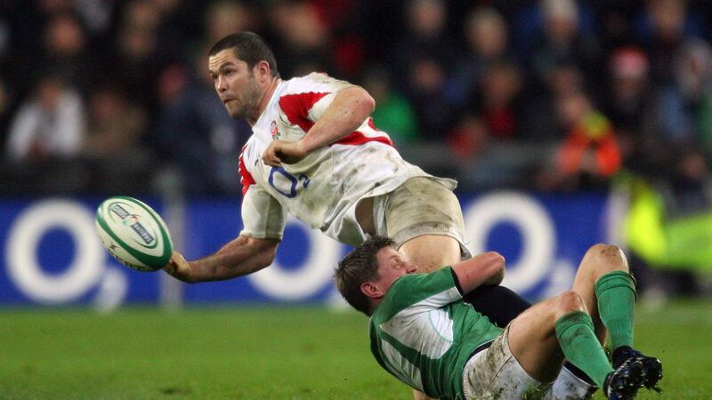 England’s Andy Farrell is  tackled by Ireland’s Ronan O’Gara at Croke Park in February 2007: ‘I think that was the perfect performance . . . They had to win, they had to perform.’ Photograph: Billy Stickland/Inpho