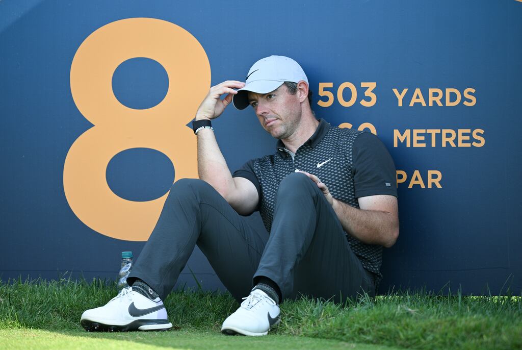 Rory McIlroy sits on the eight tee as he waits to tee off during the second round of the Italian Open. Photograph: Stuart Franklin/Getty Images
