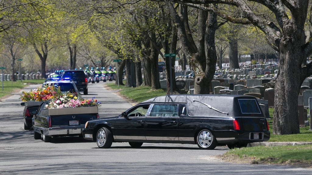A hearse carrying the body of Krystle Campbell, one of three people killed in the Boston Bombings, arrives at Oak Grove Cemetery in Medford today. Photograph: Katherine Taylor/The New York Times