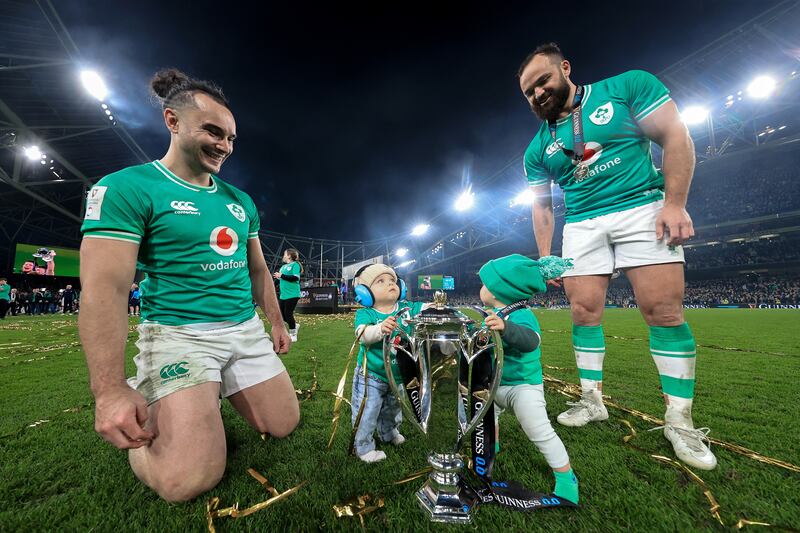 James Lowe and Jamison Gibson-Park with their sons Nico and Jai after Ireland's win over Scotland last year. Photograph: Dan Sheridan/Inpho