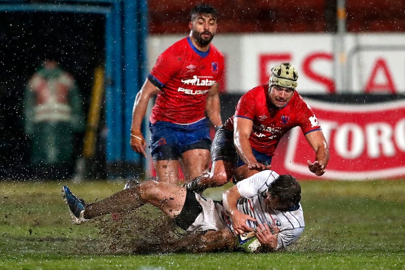 Chile's Matias Garafulic heads for the USA's Dublin-born fly-half AJ MacGinty during the teams' play-off for qualification for this year World Cup. Photograph: Javier Torres/AFP via Getty Images