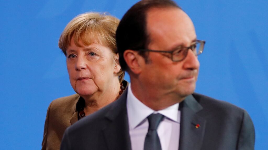 Another one down: Angela Merkel with soon-to-gone French president François Hollande in Berlin on Tuesday. Photograph: Reuters/Fabrizio Bensch