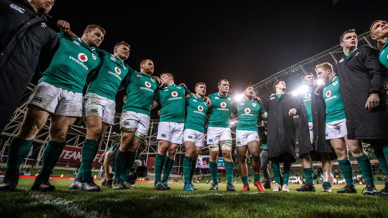 The Ireland team huddle after the game. Photograph: James Crombie/Inpho