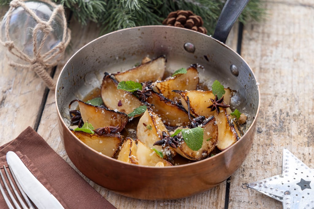 Sweet and sour pot-roasted turnips with star anise, maple syrup and toasted hazelnuts. Photograph: Harry Weir