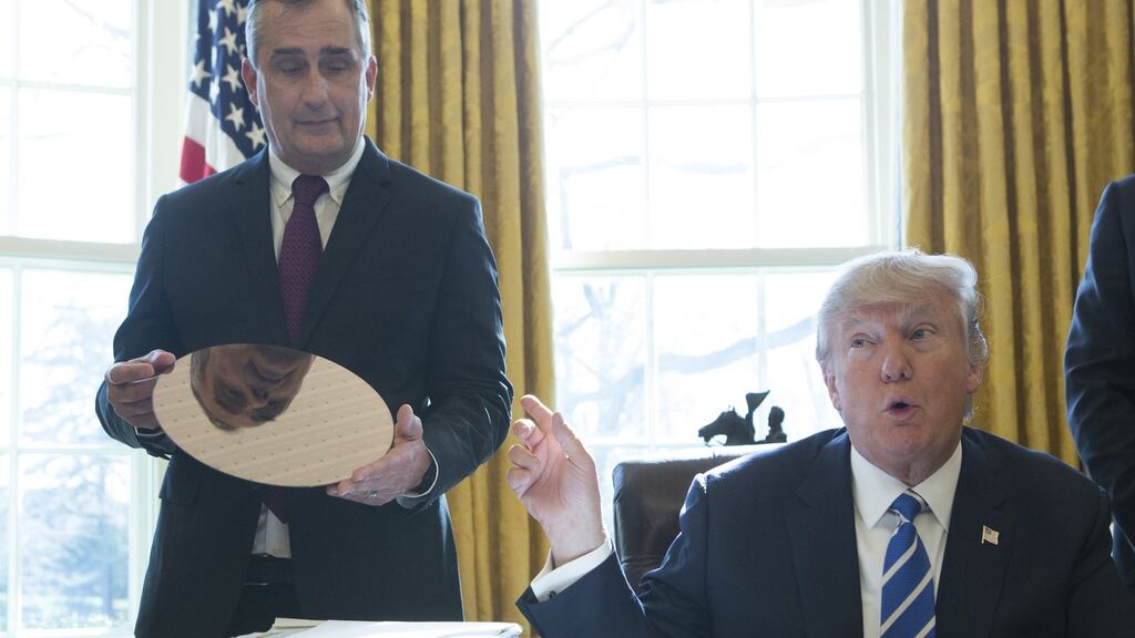 Intel chief executive Brian Krzanich with US president Donald Trump at the White House. Photograph: Chris Kleponis/Bloomberg