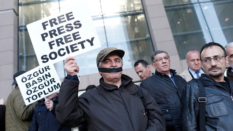 Protesters at Istanbul courthouse on Friday, where journalists Can Dündar and Erdem Gül were being tried on charges of espionage and publicising state secrets. Photograph: Sedat Suna/EPA