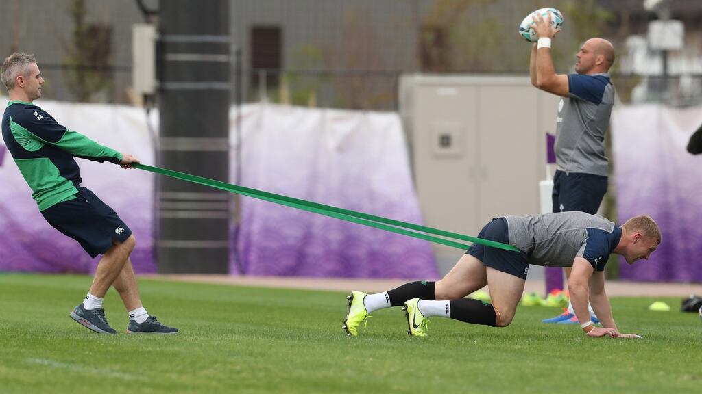 Ireland doctor Ciaran Cosgrave with Keith Earls during training ahead of the Rugby World Cup quarter-final against New Zealand. Photo: Billy Stickland /Inpho