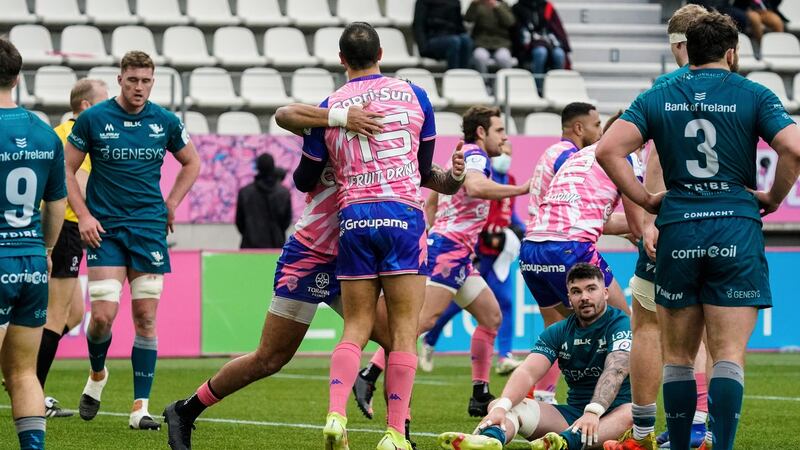 Stade Francais’ Kylan Hamdaoui is congratulated after he runs in a try. Photograph: Dave Winter/Inpho