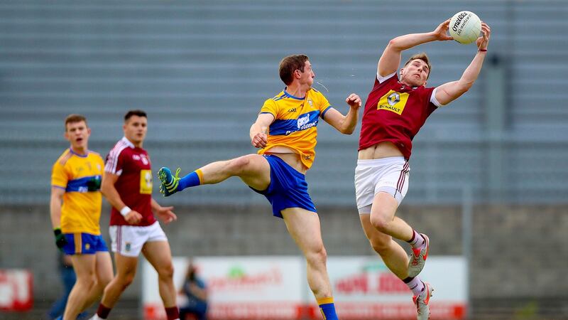Westmeath’s Kieran Martin claims the ball ahead of Clare’s Cathal O’Connor during the All-Ireland SFC third-round qualifier against Westmeath at TEG Cusack Park in Mullingar. Photograph: Tommy Dickson/Inpho
