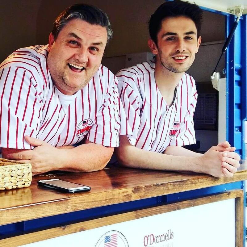 Simon Delaney (left) in his Simply Simon's US diner food truck at Kildare Village