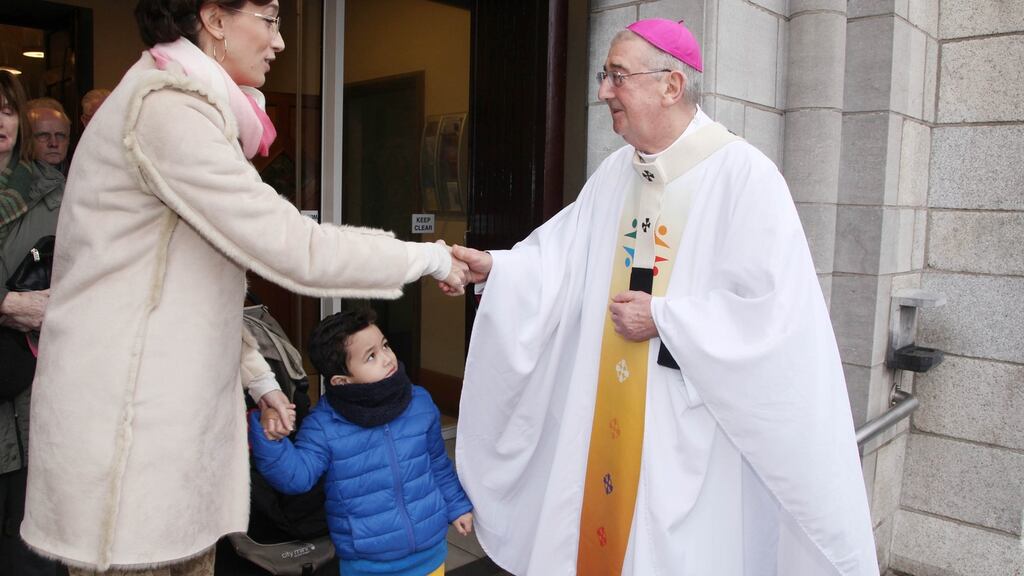 Archbishop Diarmuid Martin greeting Mass goers in Dublin. Photograph: John Mc Elroy