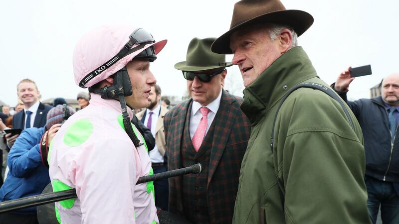 Jockey Paul Townend with owner Rich Ricci and trainer Willie Mullins after Faugheen’s impreeivs return at Punchestown. Photograph: Brian Lawless/PA